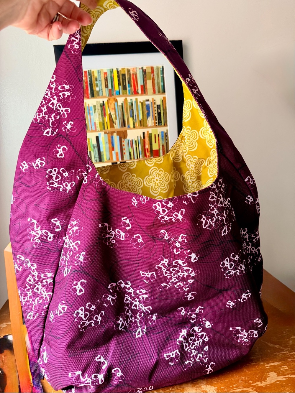 Haiku reversible tote in plum/green with matching wallet